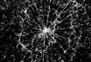 depositphotos_48818645-stock-photo-background-of-black-broken-glass