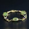 Heirloom amethyst and green jewellery redesign bracelet side