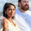 Stalactite-couple wearing ring bracelet and dangling earrings