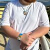 Stalactite-curved pendant and bracelet worn by man